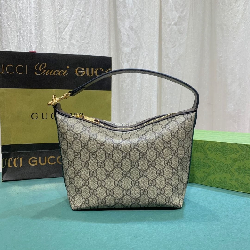 G*u*i top handle bags